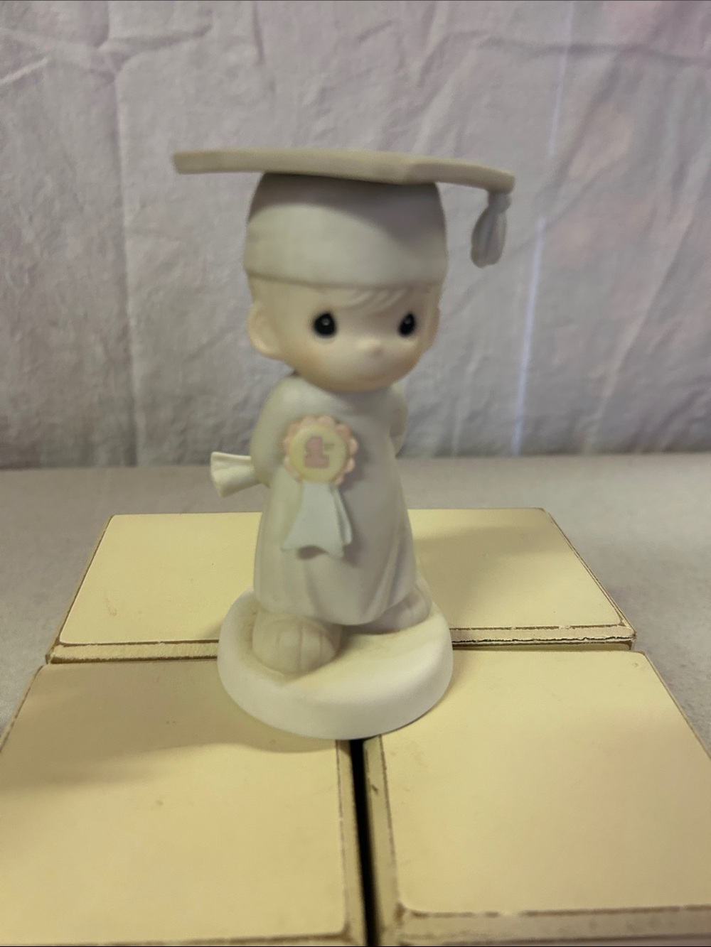 Precious Moments Porcelain Graduate Figurine in White and Pastel Pink
